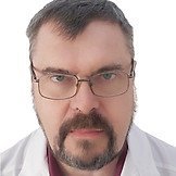 Врач Каретников Игорь Александрович